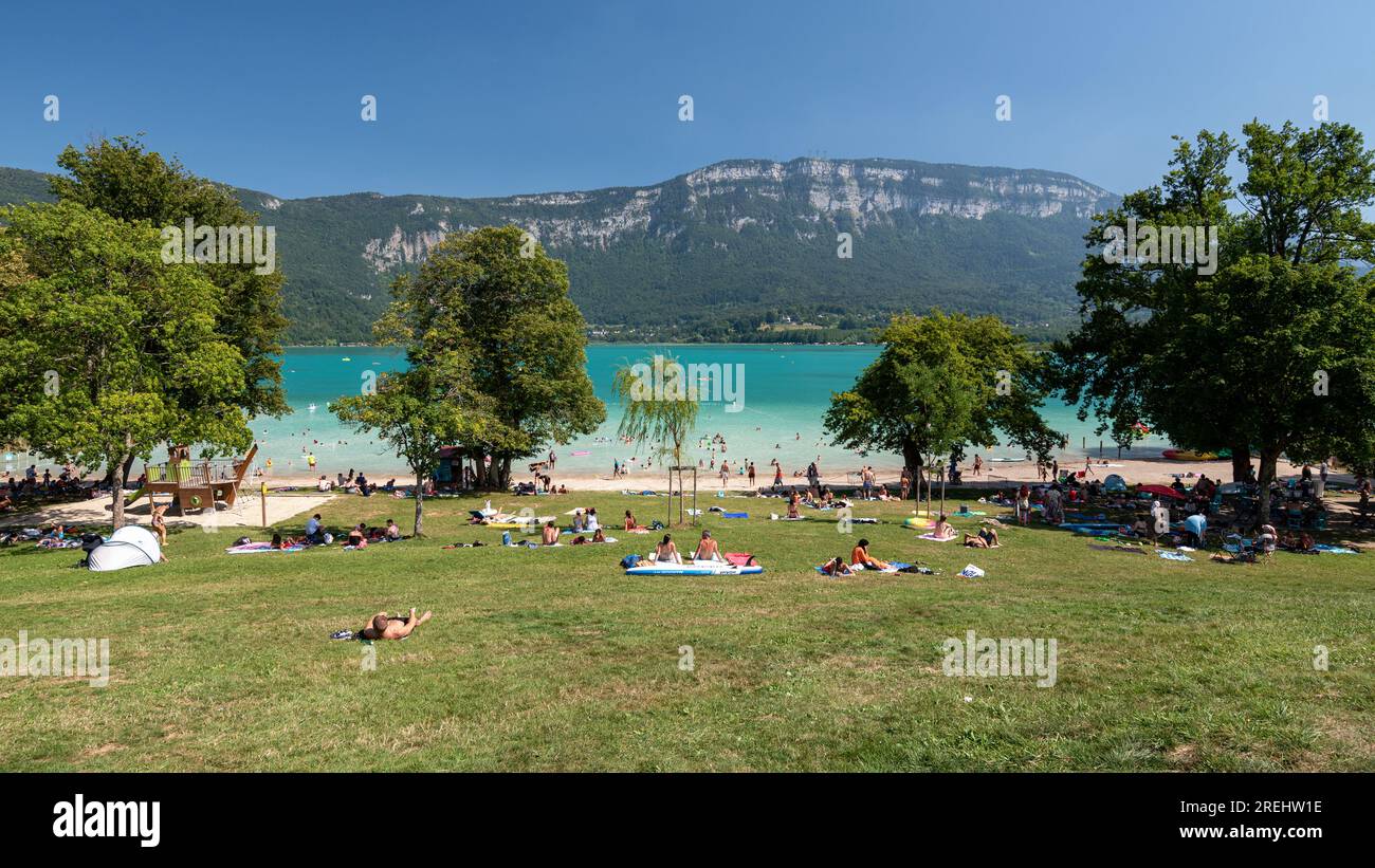Sougey Beach on the edge of Lac d'Aiguebelette, a natural lake know for its blue-green colour, located in the commune of Aiguebelette-le-lac. Stock Photo