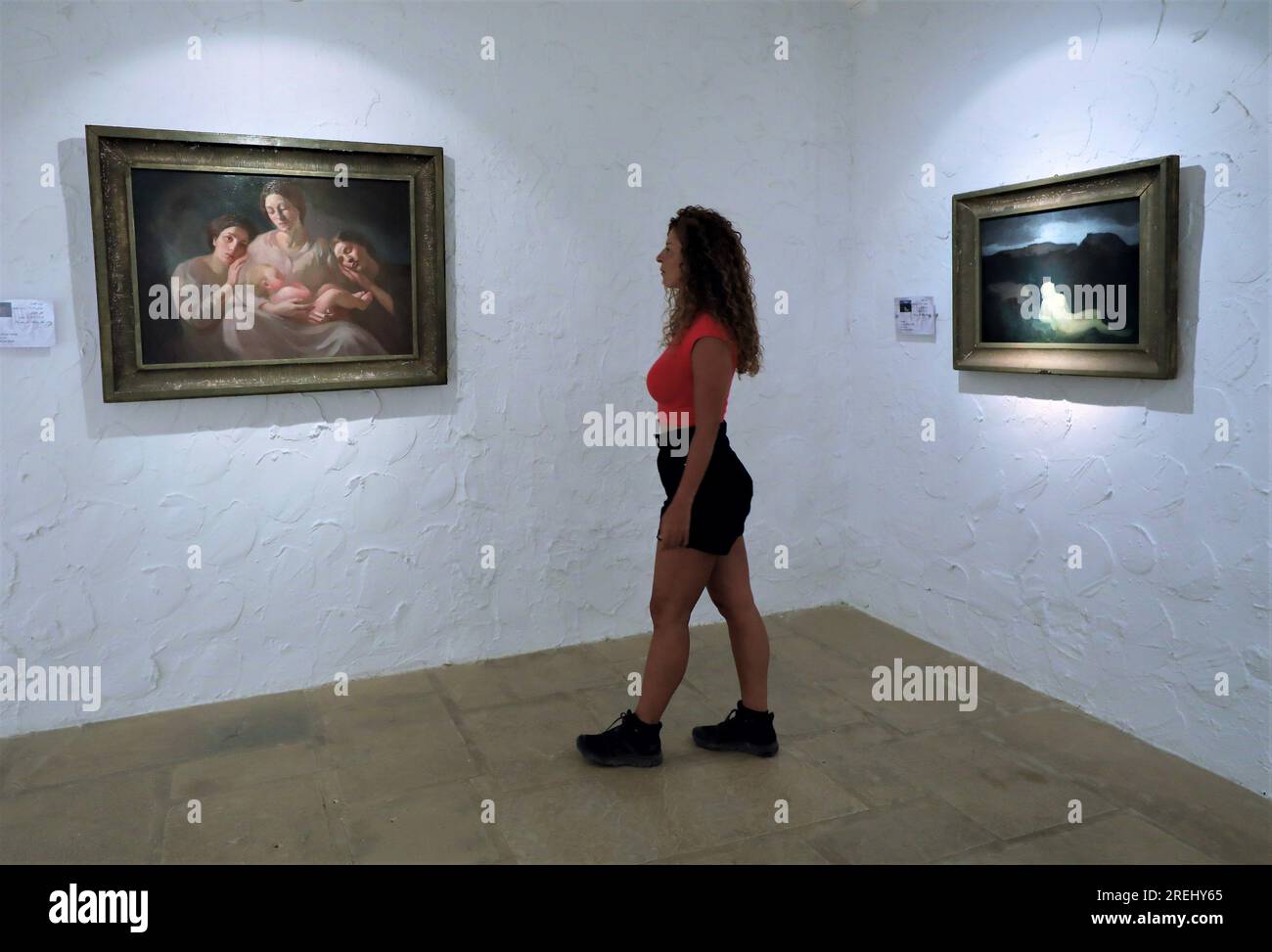 Bcharre, Lebanon. 27th July, 2023. A tourist looks at one of Gibran's