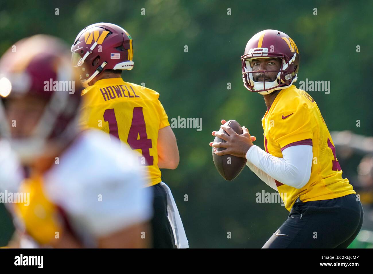 Washington Commanders quarterback Jacoby Brissett (12) looks to pass ...
