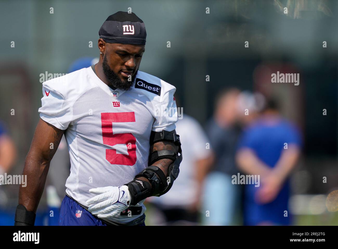 New York Giants linebacker Kayvon Thibodeaux (5) wears a brace on his left  arm while participating in training activities at the NFL football team's  practice facility, Wednesday, July 26, 2023, in East