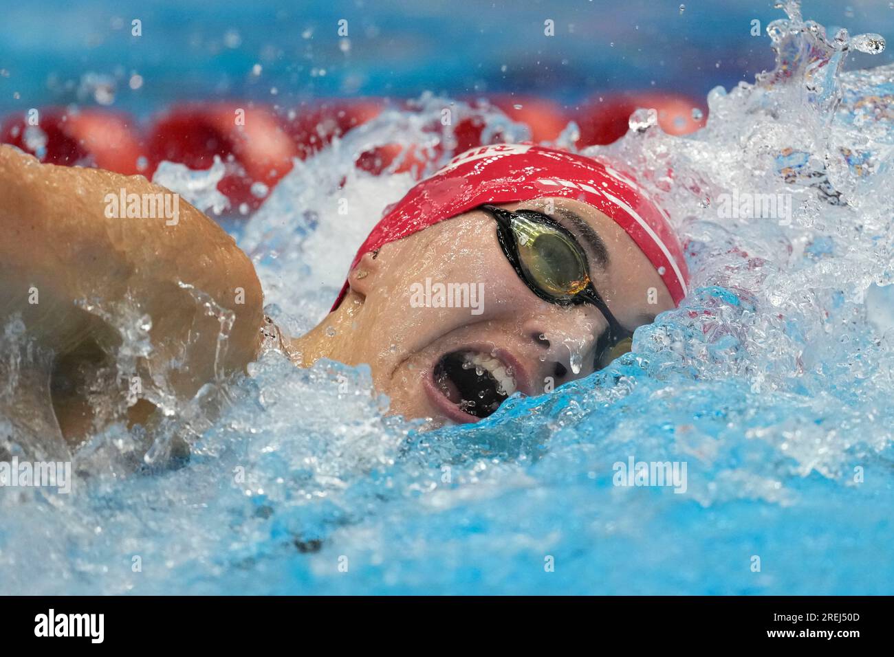 Poland's Kornelia Fiedkiewicz competes during the women's 100m