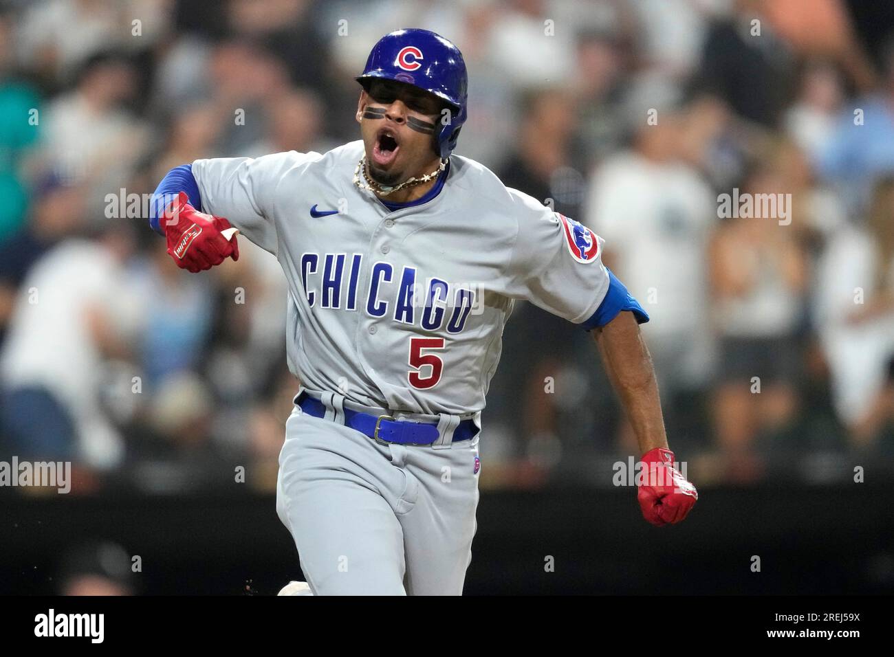 Chicago Cubs' Christopher Morel celebrates down the first base line his ...