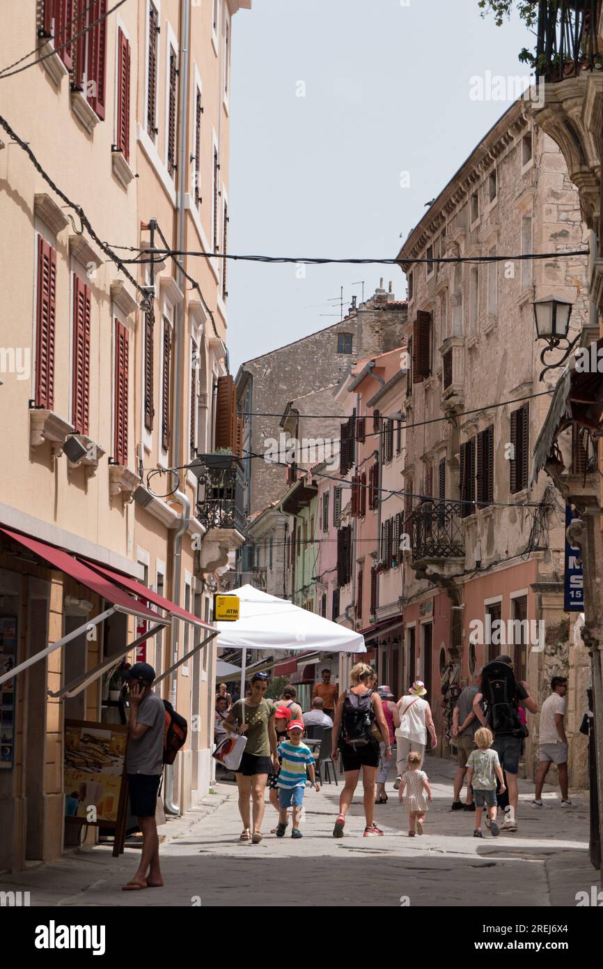 View of Pula (Pola) in Croatia with people and tourists walking on the street Stock Photo