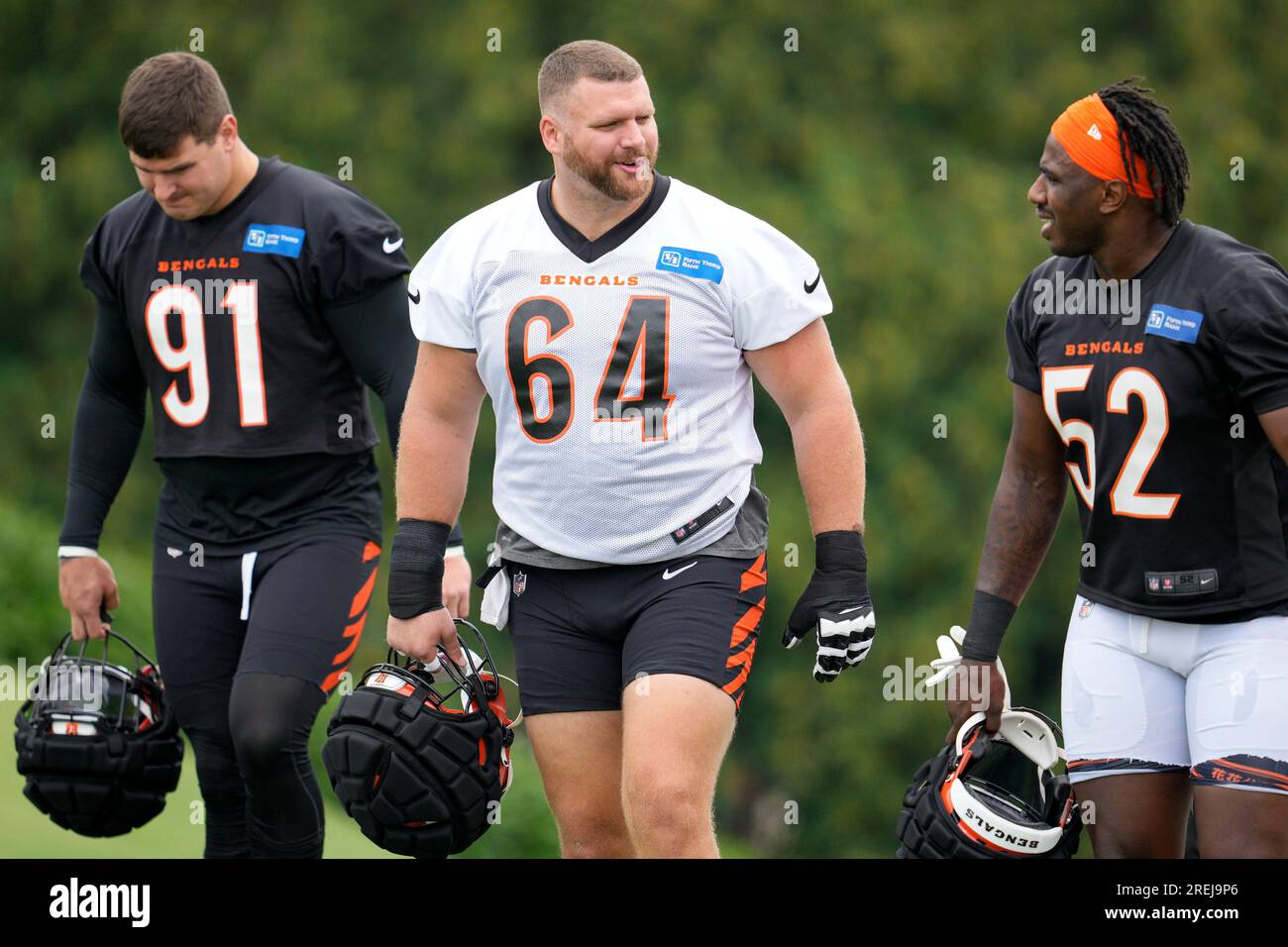 Cincinnati Bengals' Trey Hendrickson (91), Ted Karras (64) and Tarell  Basham (52) enter the training facility during the NFL football team's  training camp, Thursday, July 27, 2023, in Cincinnati. (AP Photo/Jeff Dean  Stock Photo - Alamy