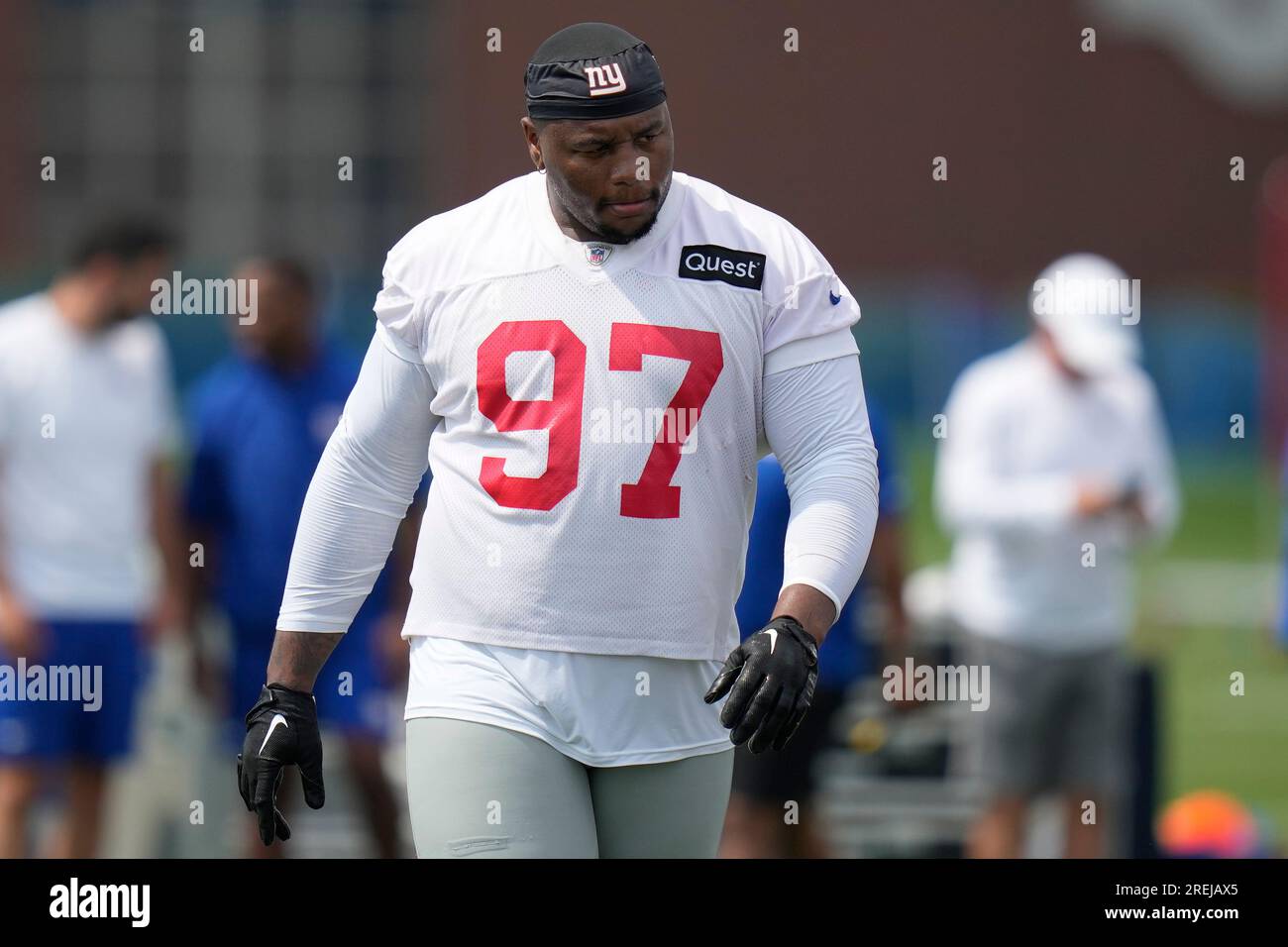 NFC defensive tackle Dexter Lawrence (97) of the New York Giants films a  Blue Man during the flag football event at the NFL Pro Bowl, Sunday, Feb.  5, 2023, in Las Vegas. (