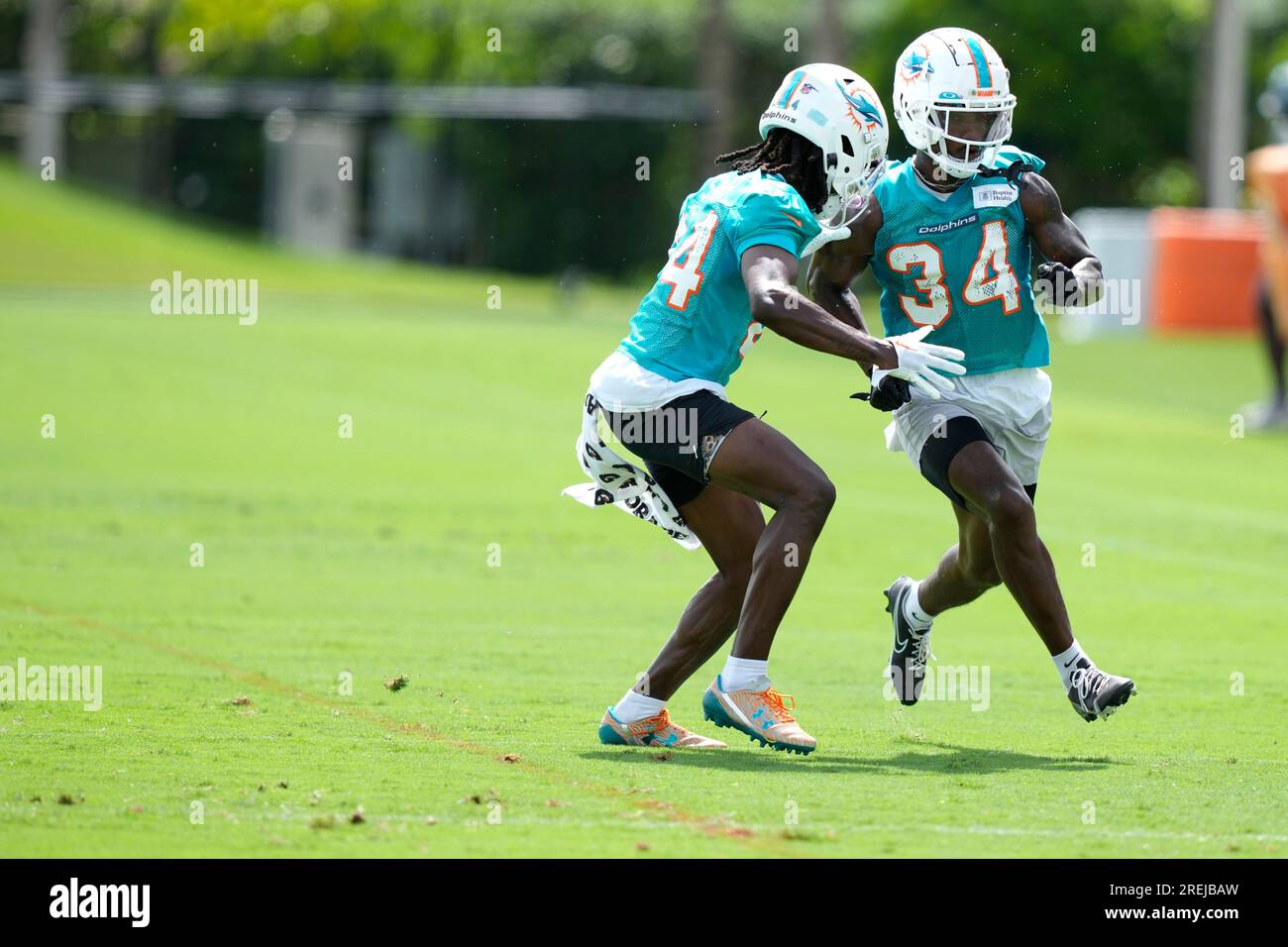 Miami Dolphins cornerback Tino Ellis (34) runs drills during practice at  the NFL football team's training facility, Wednesday, July 26, 2023, in  Miami Gardens, Fla. (AP Photo/Lynne Sladky Stock Photo - Alamy