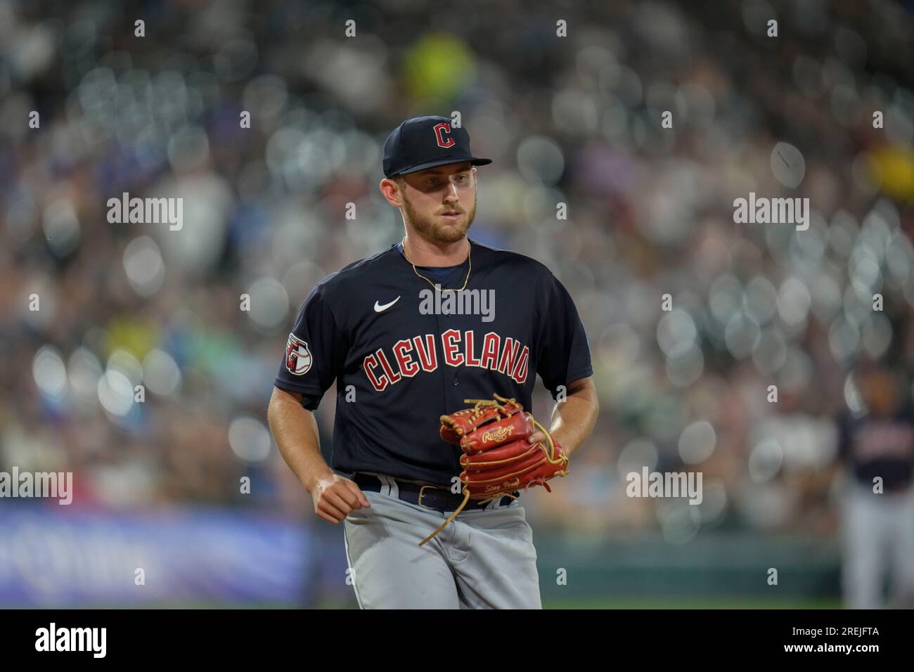 Cleveland Guardians starting pitcher Tanner Bibee walks back to the
