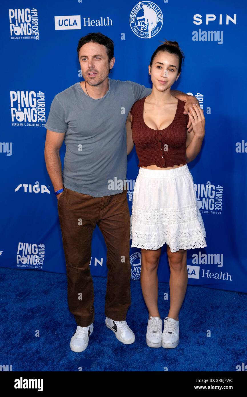 Actor Casey Affleck and his girlfriend, Caylee Cowan, pose