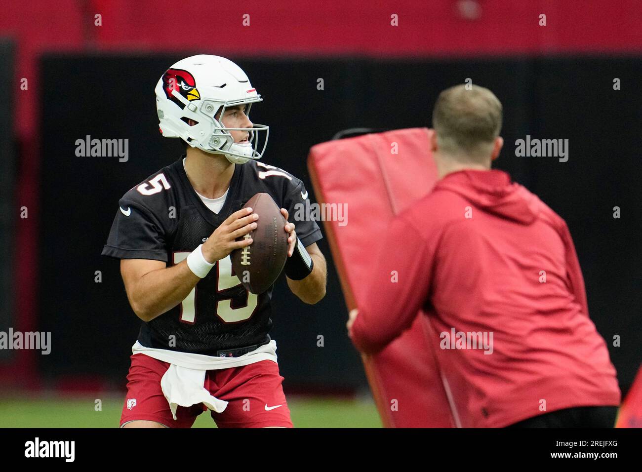 Arizona Cardinals quarterback Clayton Tune looks to pass the ball