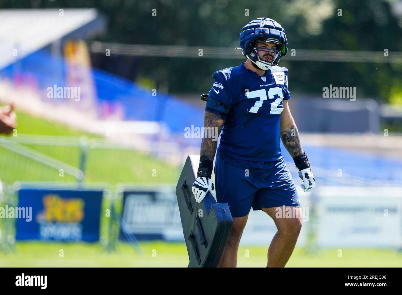 Seattle Seahawks tackle Abraham Lucas (72) walks on the field