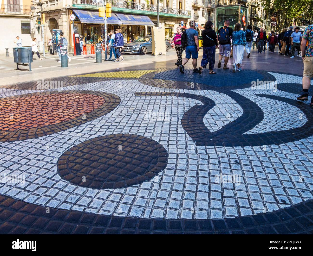 The Joan Miró pavement mosaic at Plaça Boqueria halfway along Las Ramblas in Barcelona, Catalonia, Spain. Stock Photo