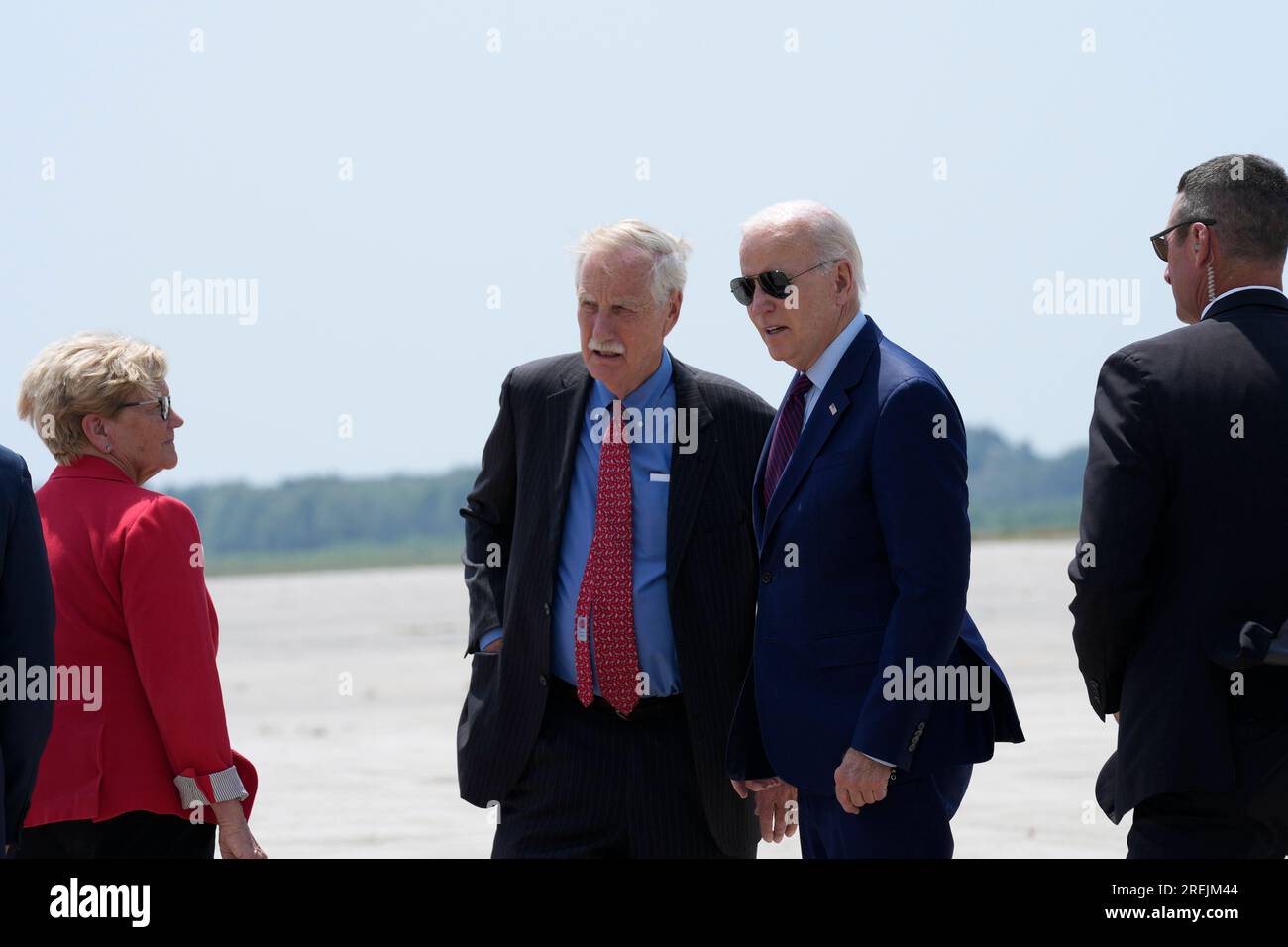 President Joe Biden talks with Sen. Angus King I Maine as he arrives at Brunswick Executive Airport in Brunswick Maine Friday July 28 2023. Biden is in Maine for the first time of