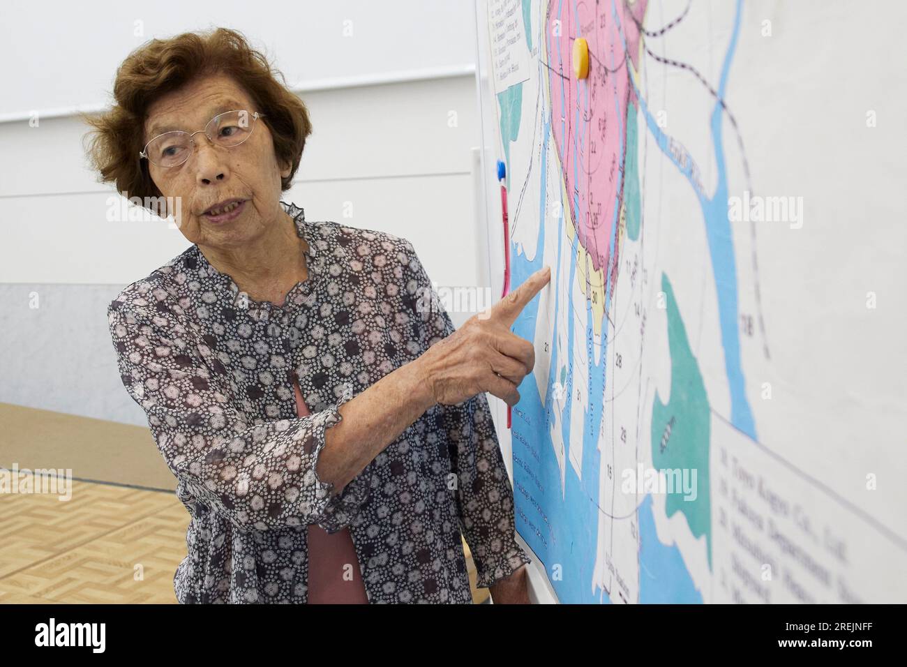 July 27, 2023, Hiroshima, Japan: Sadae Kasaoka an atomic bomb survivor, points out on a map her home at the moment of the atomic bombing in 1945, during a special meeting with foreign journalists at Hiroshima Peace Memorial Museum. This year will mark 78 years since the atomic bombing of Hiroshima (August 6, 1945) during WWII. Japan is the only country attacked by atomic bombs. A group of foreign journalists visited the city of Hiroshima (in a press tour) ahead of the memorial ceremony. The press tour was organized by the Ministry of Foreign Affairs of Japan with the support of the Foreign Pre Stock Photo