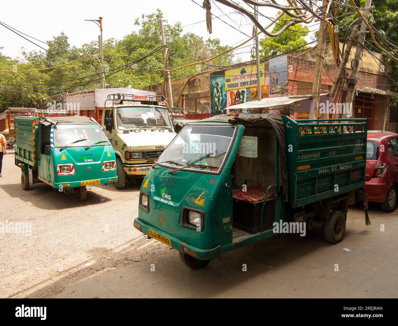 Tuk tuk small trucks using to transport goods parked on Paharganj area, New Delhi, India Stock Photo