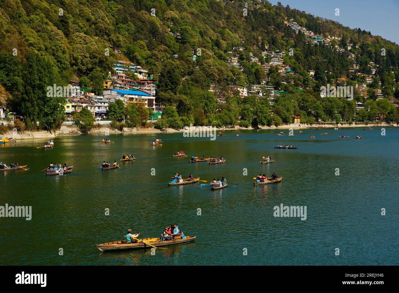 Tourists on boat ride at Nainital Lake, on the hill station of Nainital Uttarakhand, India Stock Photo