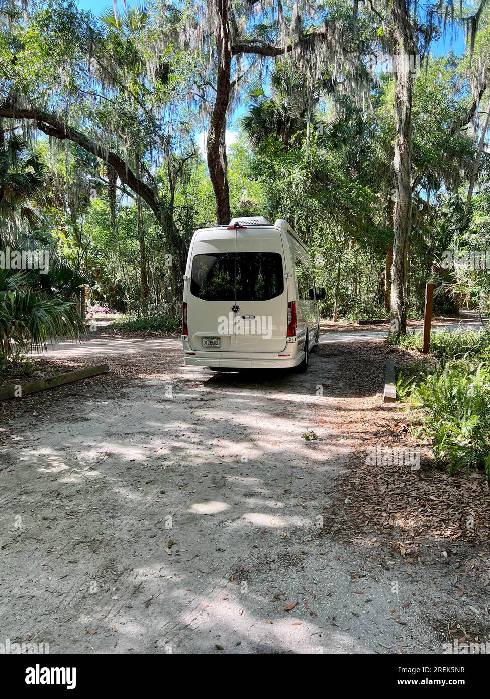 Mount Dora, FL USA March 30, 2023 A van backing into a campsite at