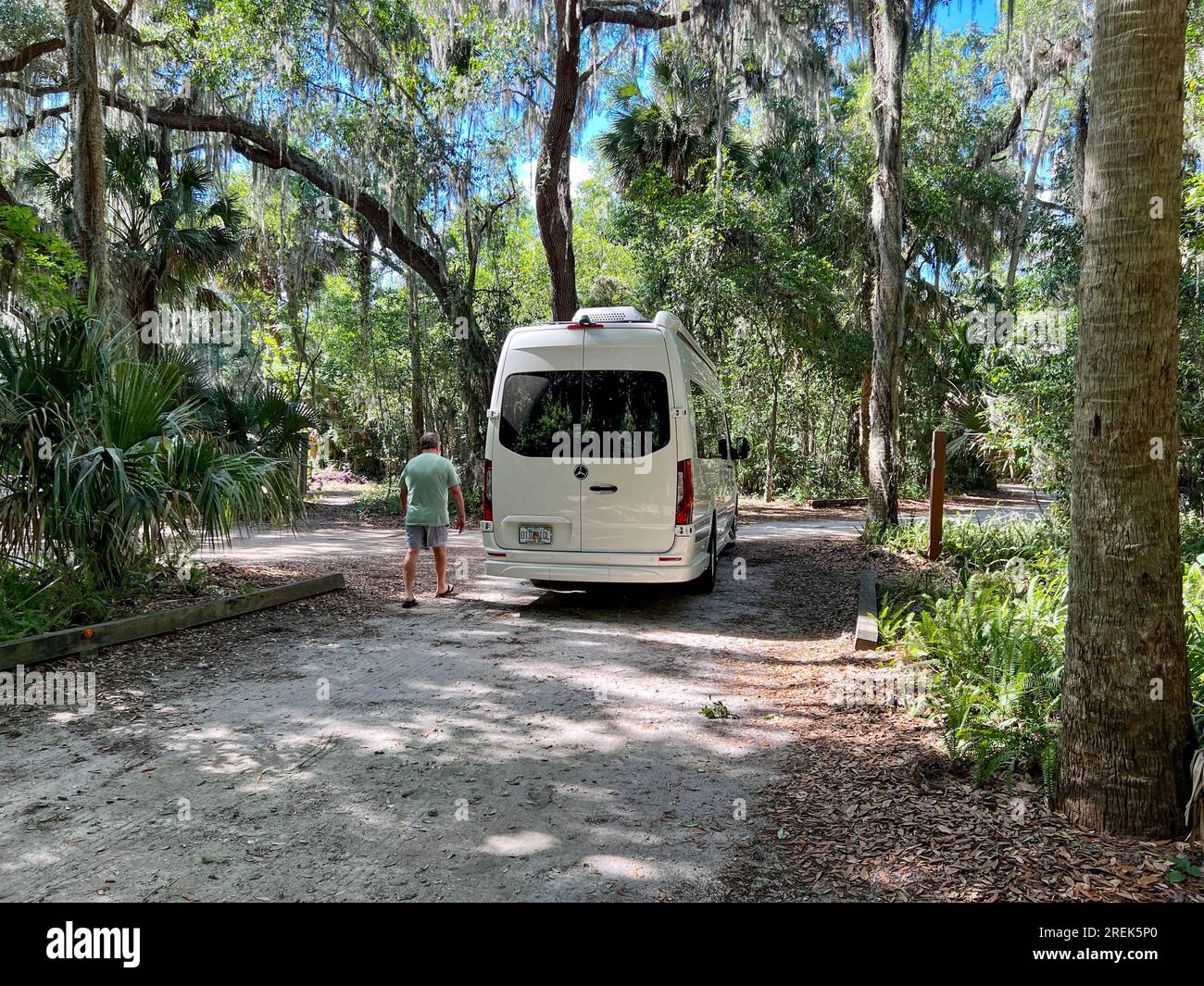 Mount Dora, FL USA March 30, 2023 A man getting into a van to back