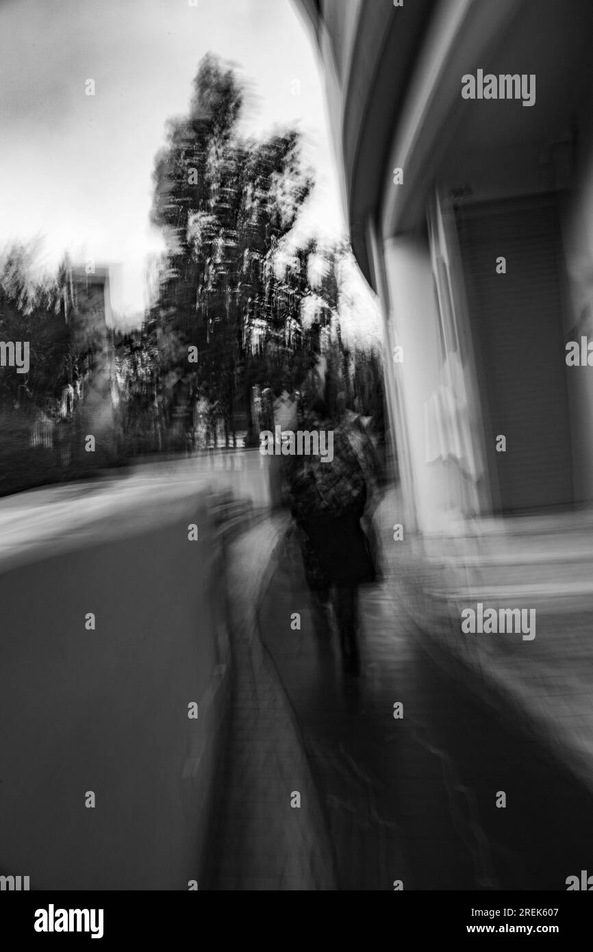 Abstract photography. Deliberately shaken, out of focus, blurred, inconsistently exposed. Creative digitally processed street photography. Stock Photo