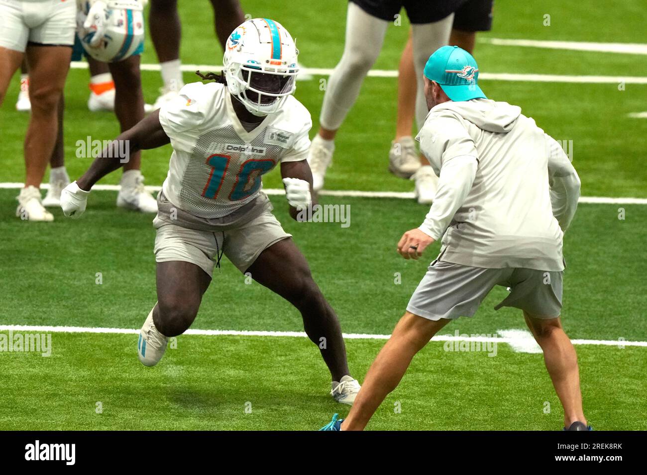 Miami Dolphins wide receiver Tyreek Hill (10) runs drills during