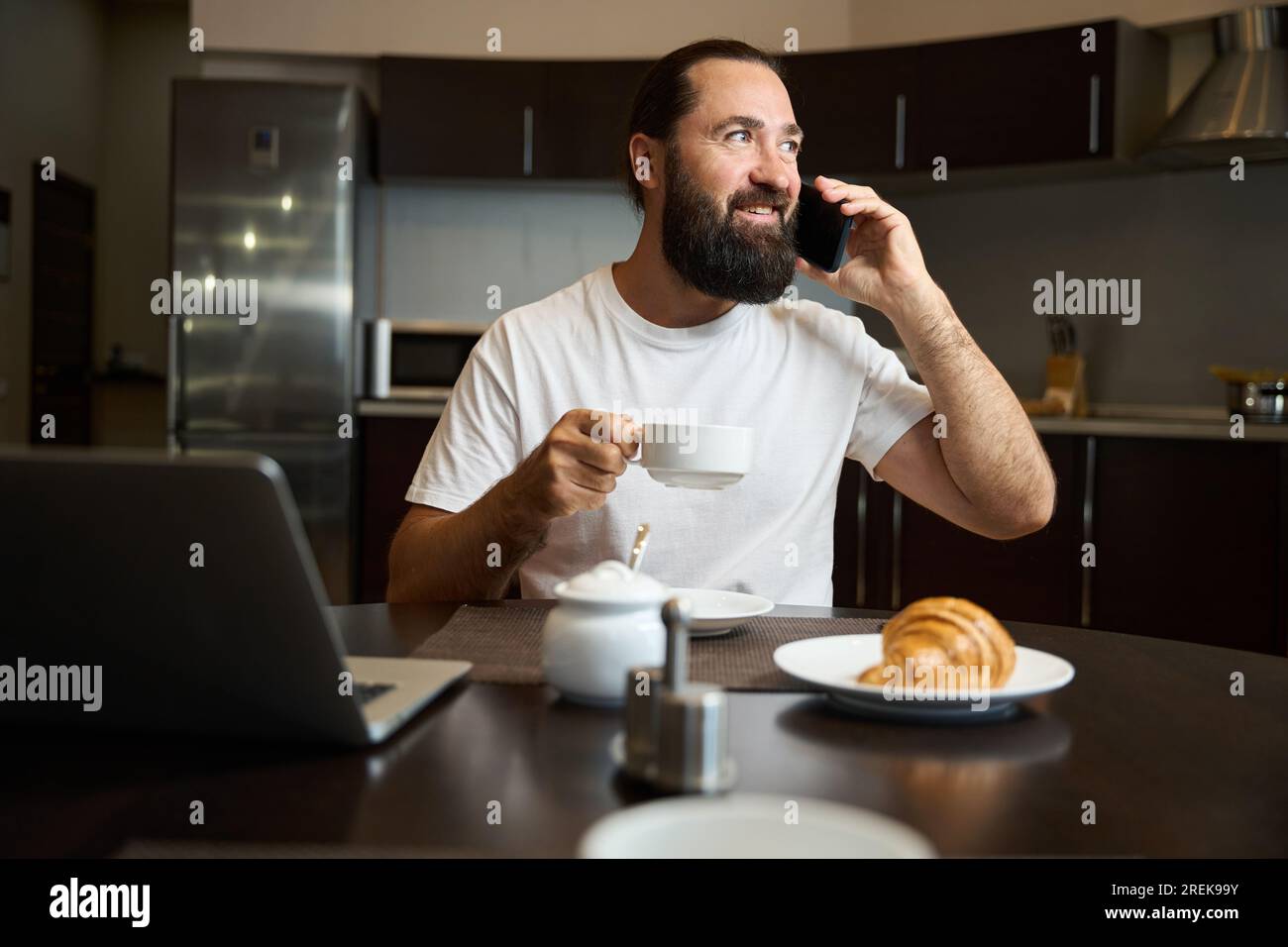 Bearded man drinks coffee on hi-res stock photography and images - Alamy