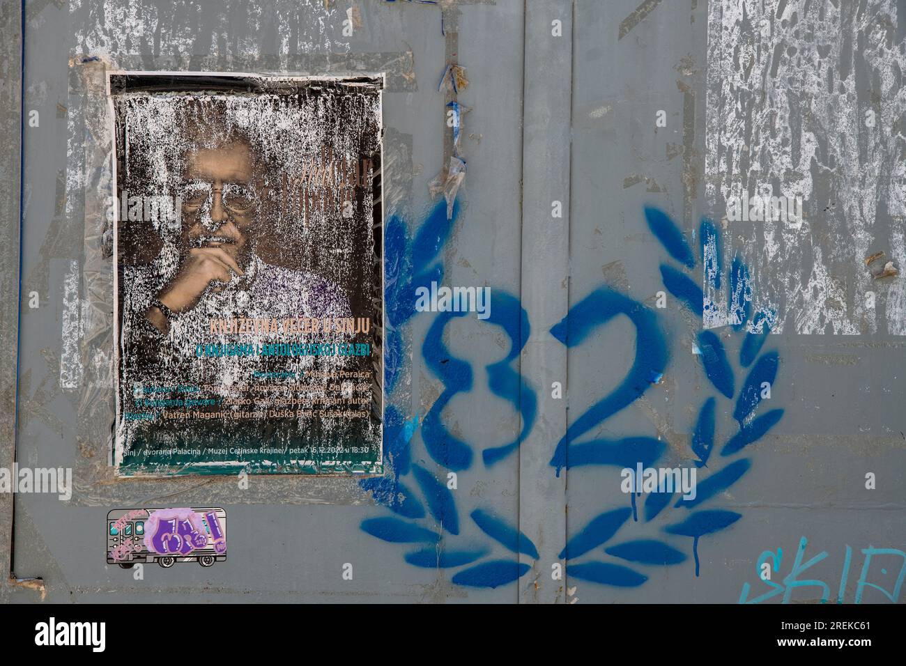 old advertising poster and 82 hajduk split football graffiti on an old garage door in split, croatia. Stock Photo