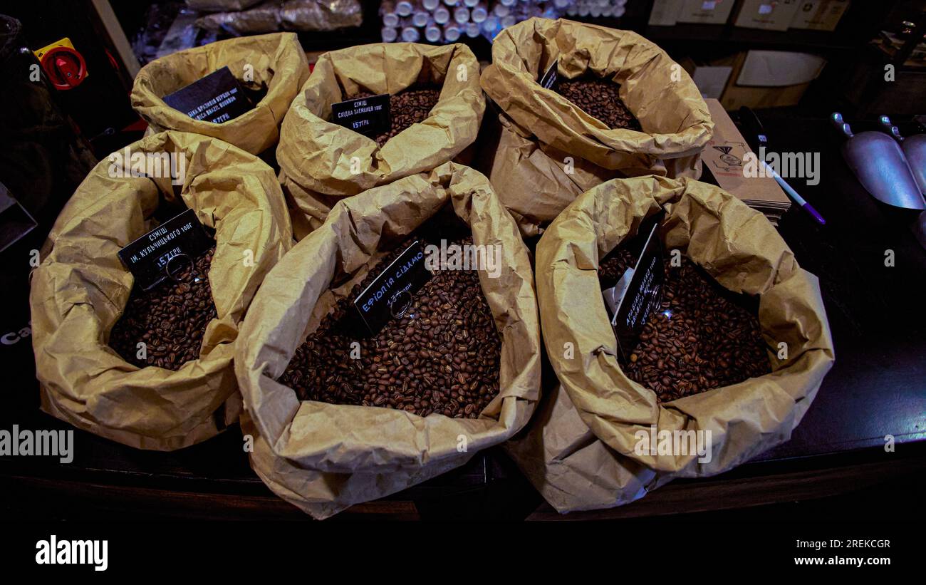 Bags with different types of coffee on a table in a coffee shop Stock Photo