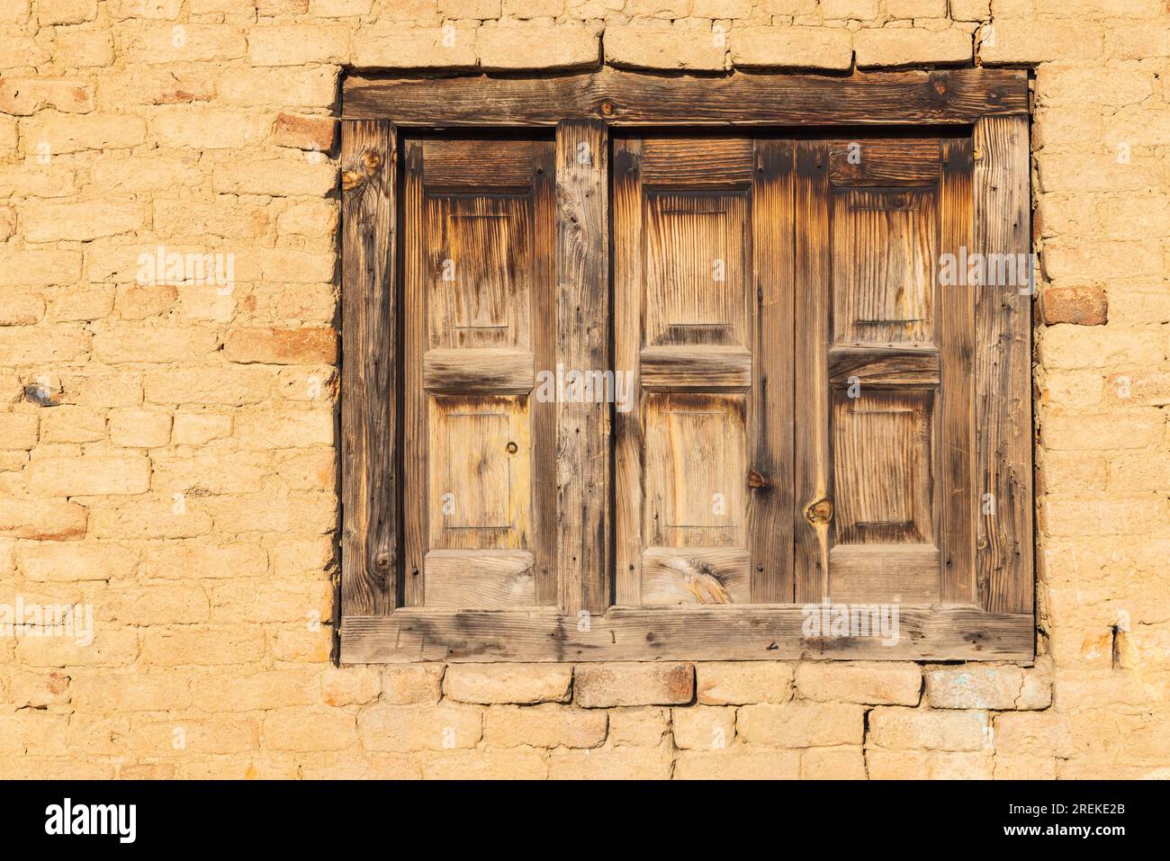 Khansahib Tehsil, Jammu and Kashmir, India. Wooden shuttered window in