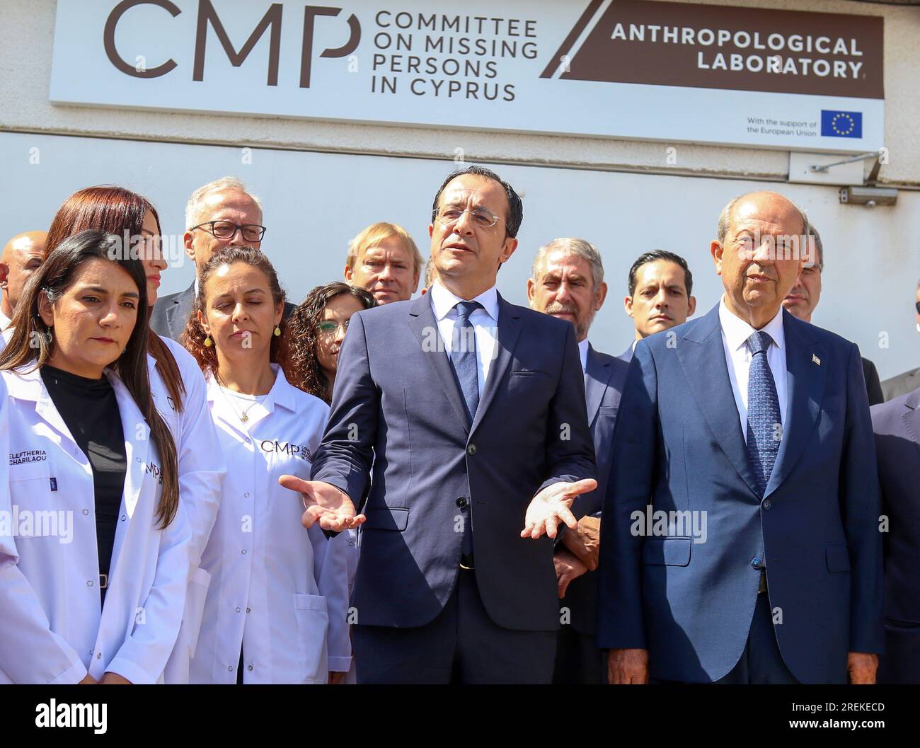 Nicosia, Cyprus. 28th July, 2023. Cyprus' President Nikos Christodoulides (2nd R, Front) and Turkish Cypriot leader Ersin Tatar (1st R, Front) visit the headquarters of the United Nations (UN)-led Committee on Missing Persons (CMP) in the old Nicosia airport complex in Nicosia, Cyprus, on July 28, 2023. Leaders of ethnically divided Cyprus held a meeting on Friday, jointly appealing to people to provide information that would help locate missing persons in conflicts, which date back almost to the establishment of the Cypriot state. Credit: George Christophorou/Xinhua/Alamy Live News Stock Photo