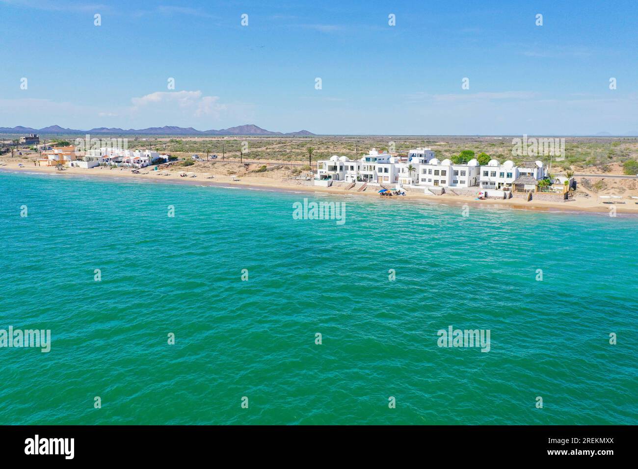 Aerial view of the beach, condominiums and apartments of Bahia de Kino