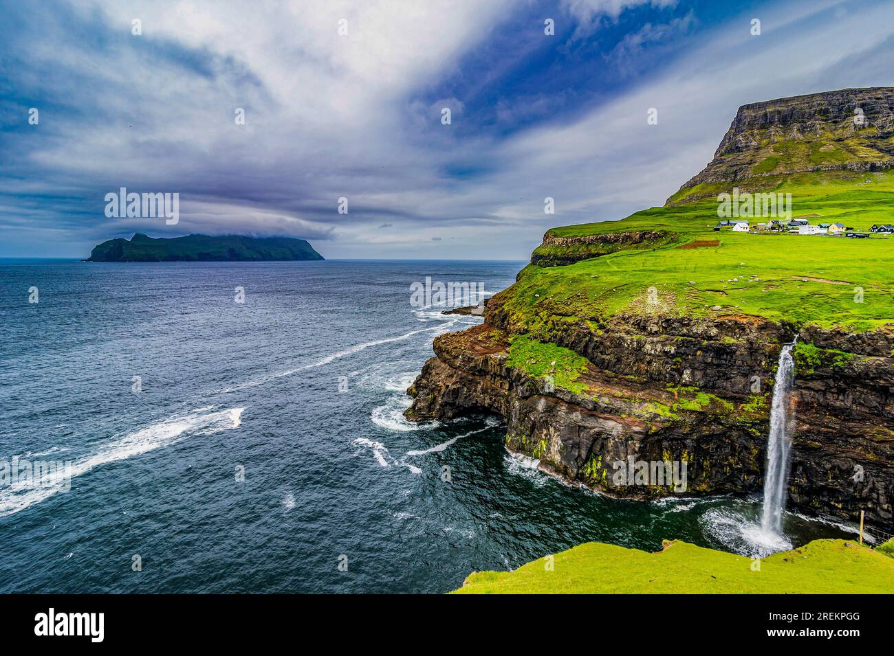 Gasadalur Waterfall Into The Ocean, Vagar, Faroe Islands, Denmark Stock 