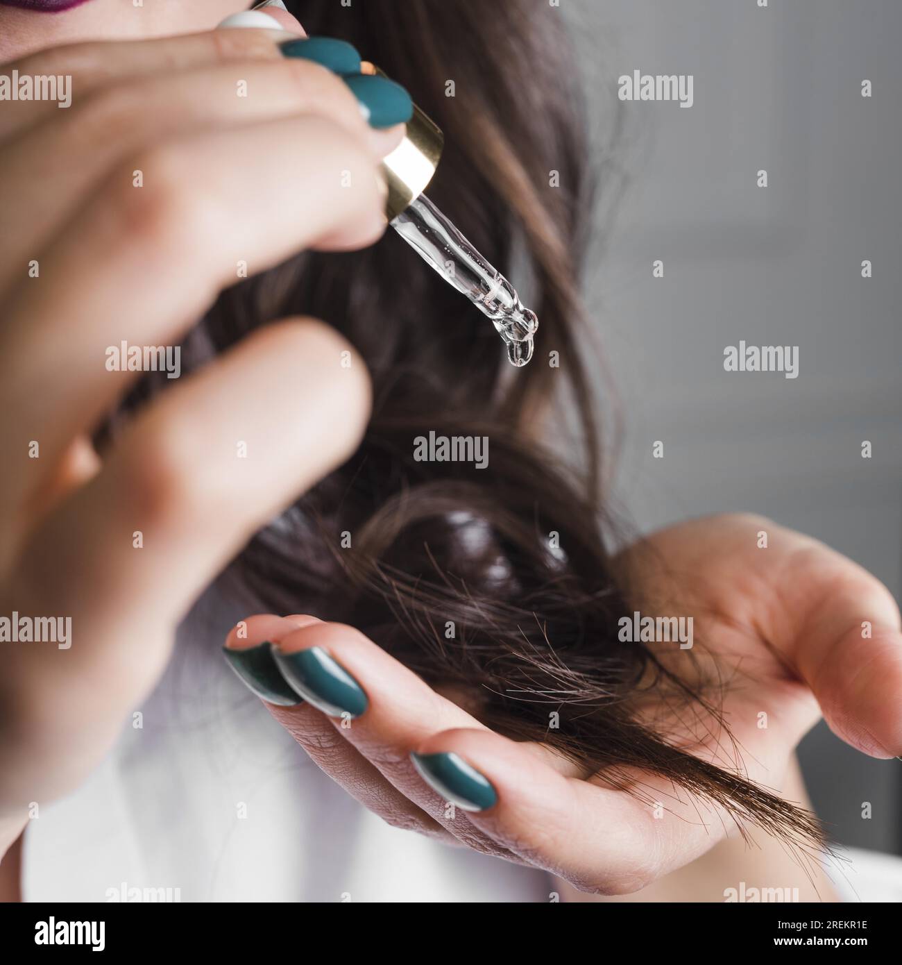 Brunette hair with serum. Resolution and high quality beautiful photo Stock Photo