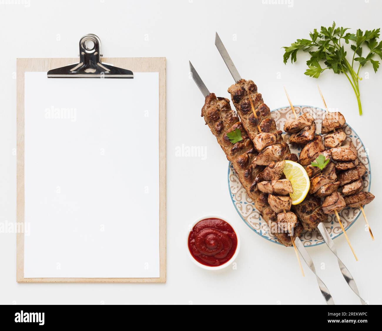 Delicious Notepad Flat lay notepad with plate delicious kebab ketchup. Beautiful photo ...