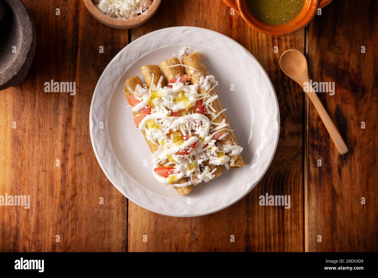 Tacos Dorados. Mexican dish also known as Flautas, consists of a rolled