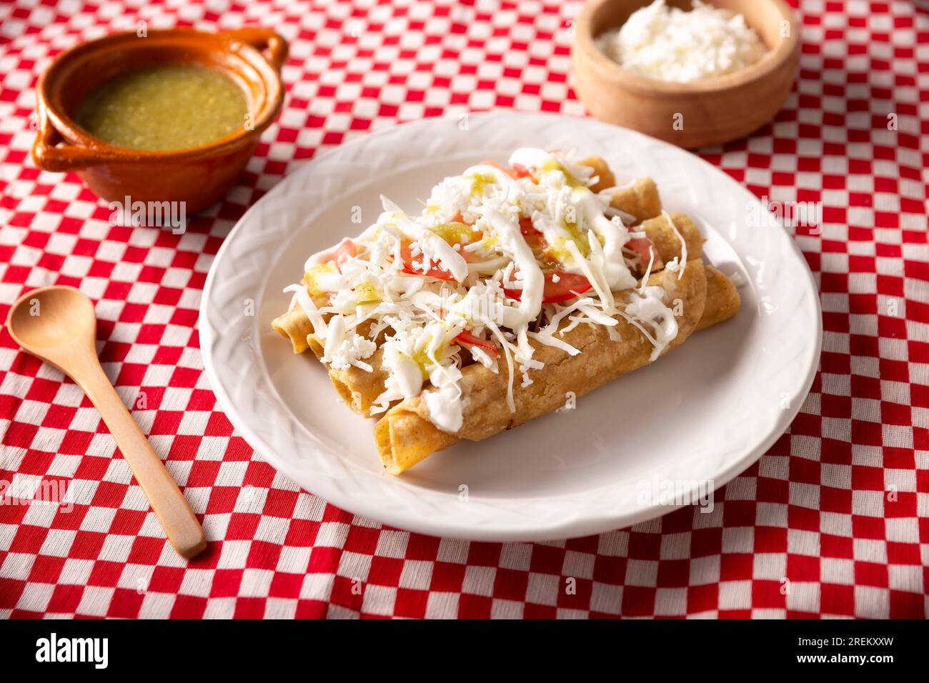 Tacos Dorados. Mexican dish also known as Flautas, consists of a rolled