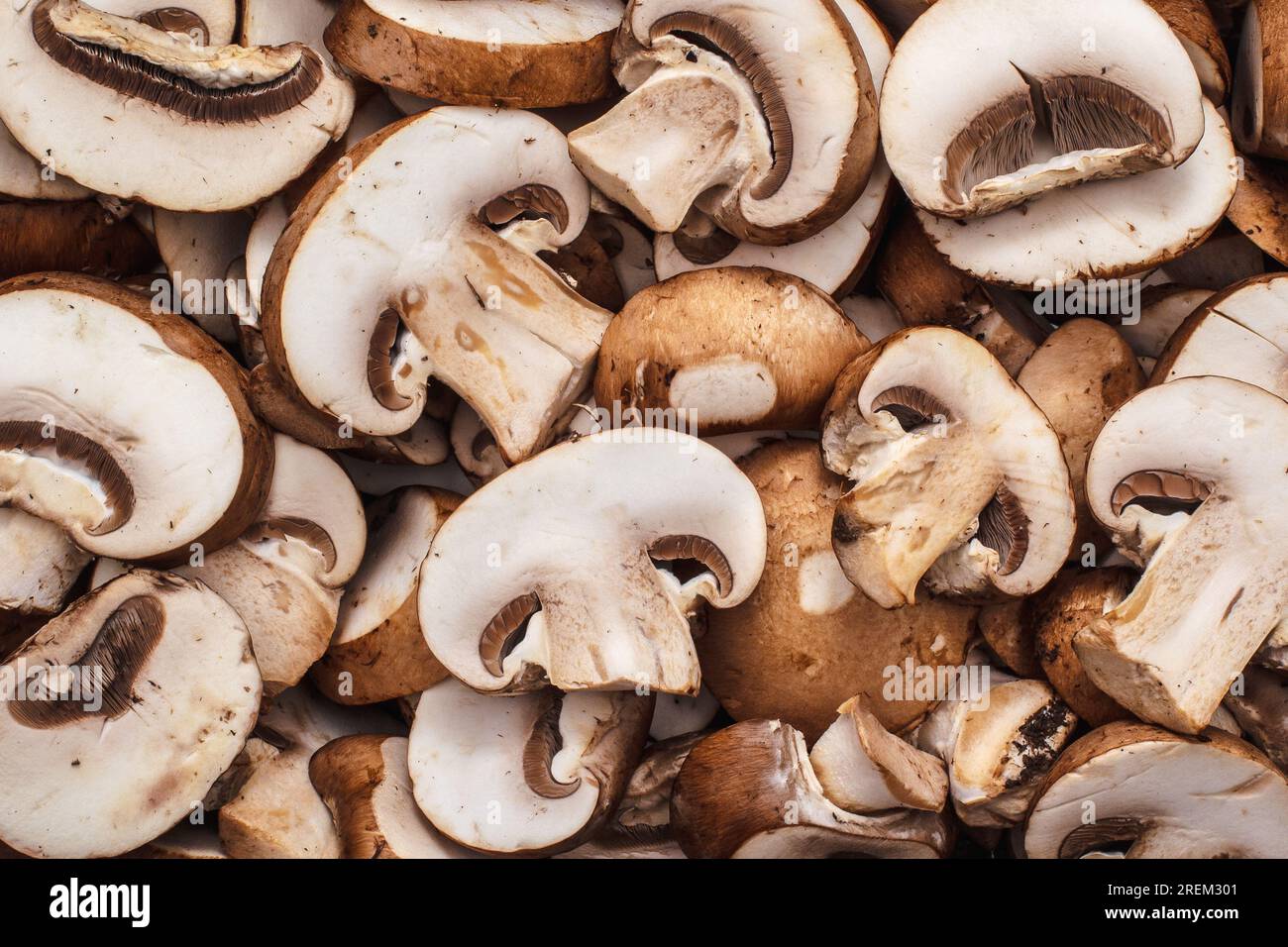 Overhead view of sliced cremini or crimini mushrooms Stock Photo - Alamy