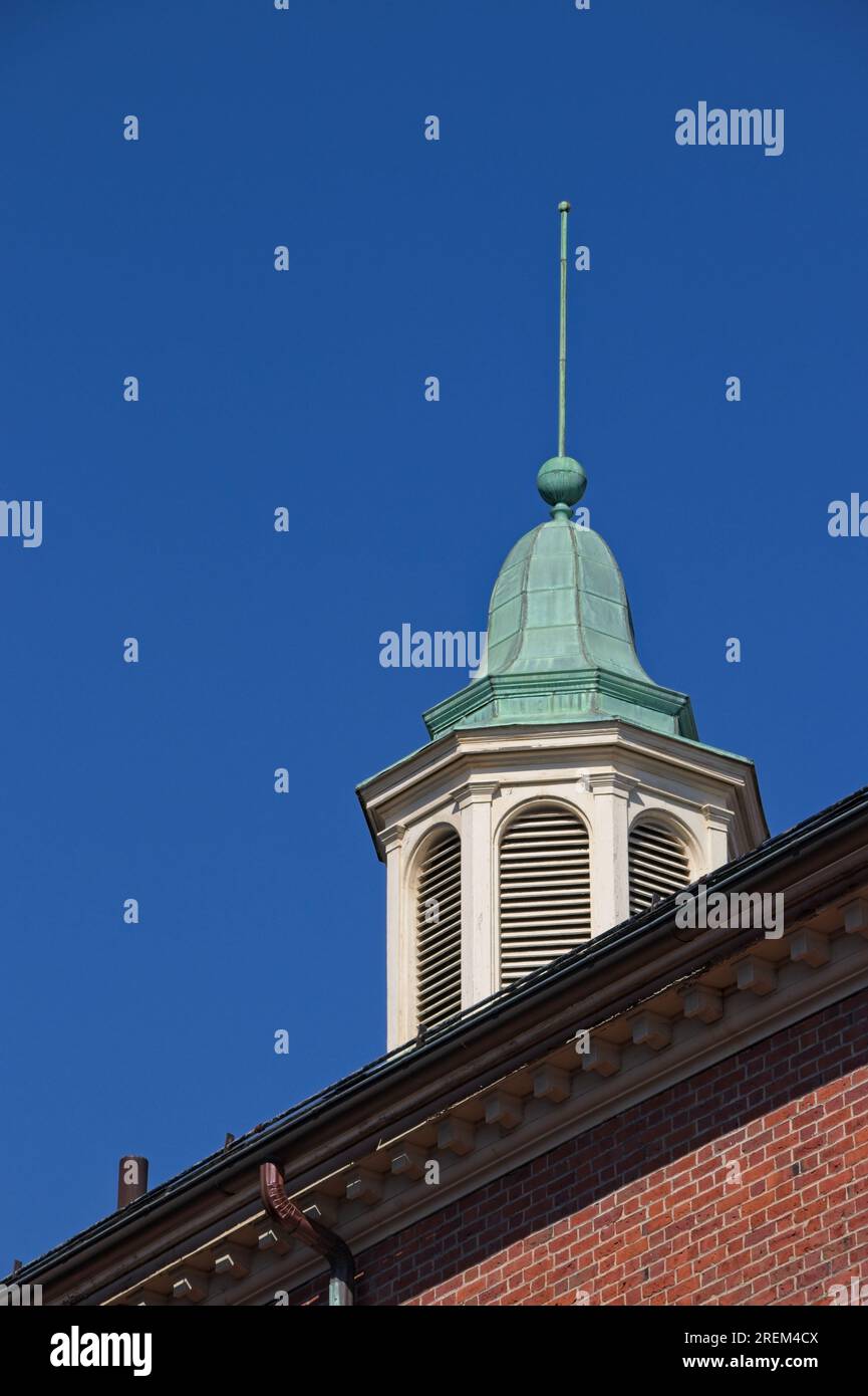 Architecturally interesting cupola and spire sits atop a building in