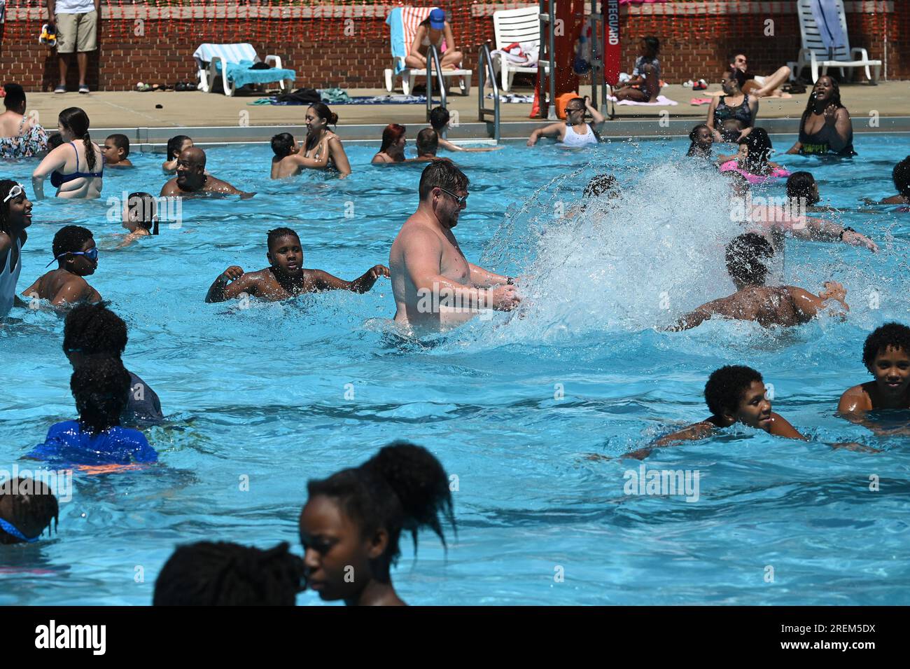 New York, USA. 28th July, 2023. Children and adults playing in the ...