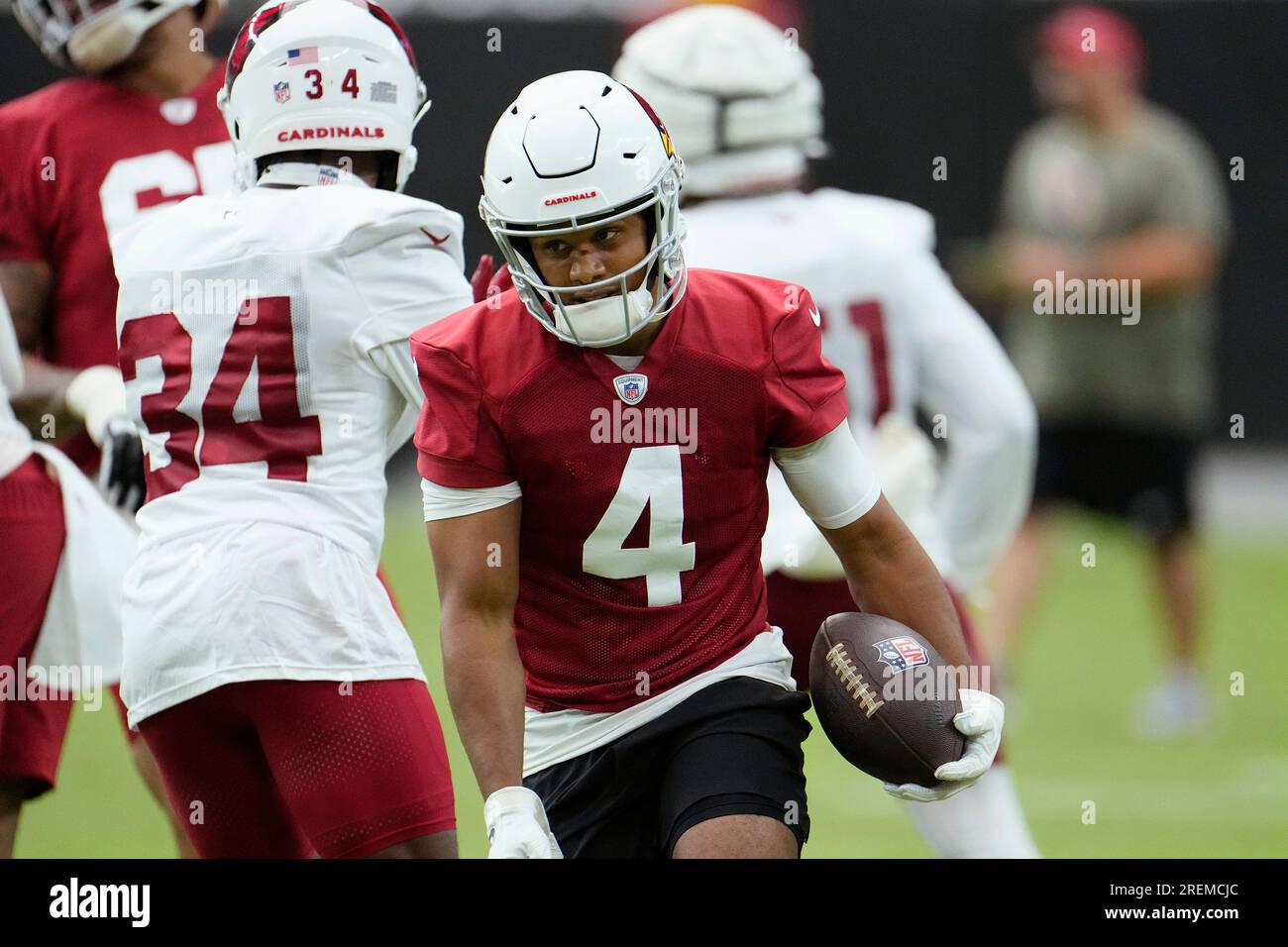 Arizona Cardinals wide receiver Rondale Moore runs with the ball during NFL football training ...