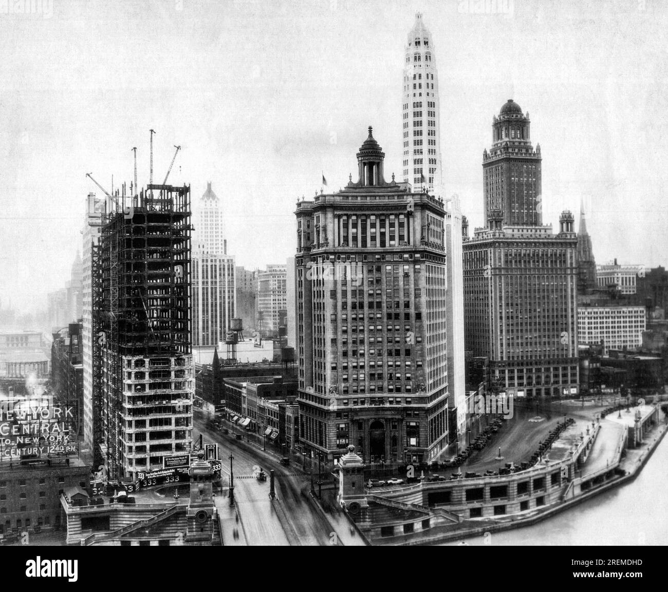 Chicago, Illinois, 1913 View looking south from the Tribune Building over the Link Bridge and other buildings left to right are '333' Building under construction, Pittsfield Building in distance, London Guarantee, Mather Tower and Pure Oil Building. Stock Photo