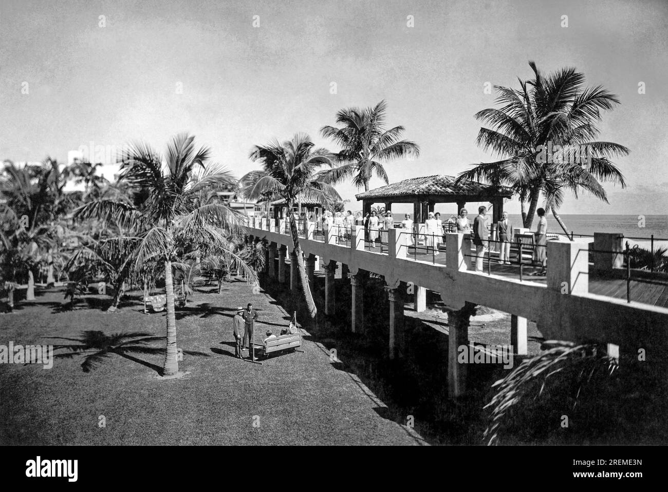 Miami Beach, Florida:  c. 1927 The upper deck of the garden promenade at the fashionable Roney Plaza Hotel in Miami Beach Stock Photo