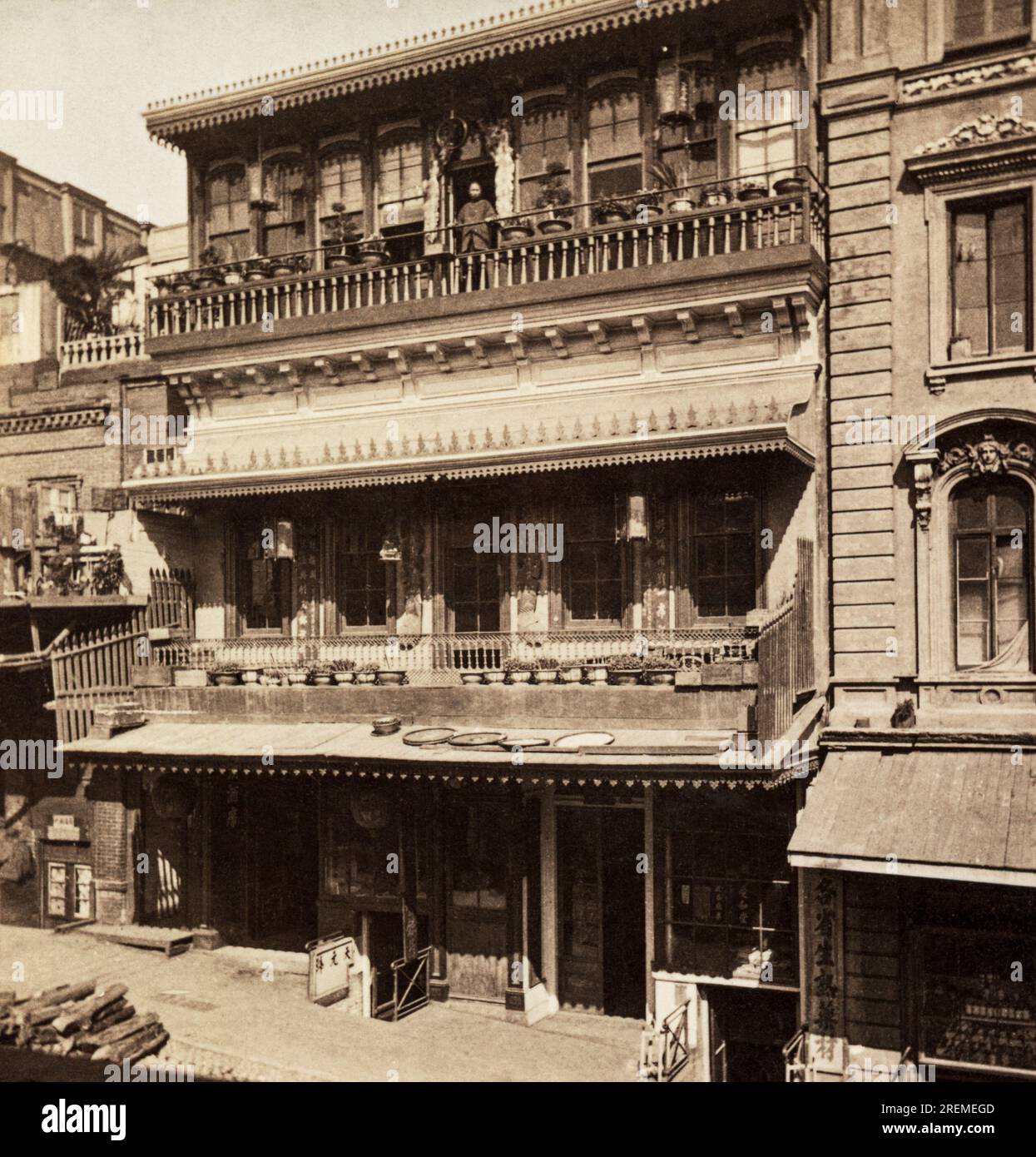 San Francisco, California:   c. 1880    A photograph of a Chinese restaurant on DuPont Ave near Sacramento Street from a Carleton Watkins stereocard.(DuPont Ave. is now Grant St.) Stock Photo