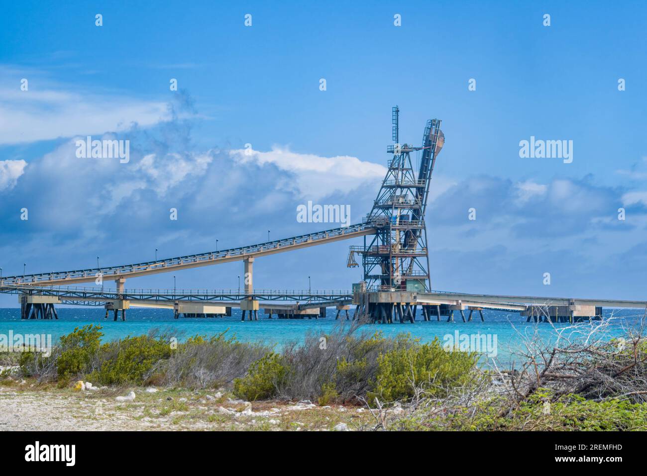 The Salt pier on south Bonaire juts out into the Caribbean and is the point where the salt is delivered  to the ships. Stock Photo