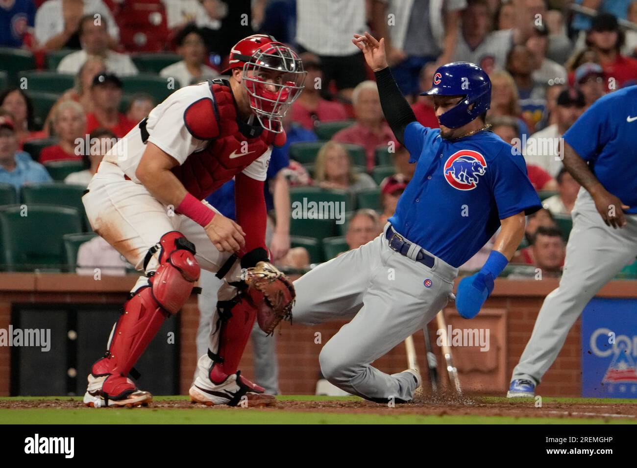 Chicago Cubs' Seiya Suzuki scores in the first inning during a