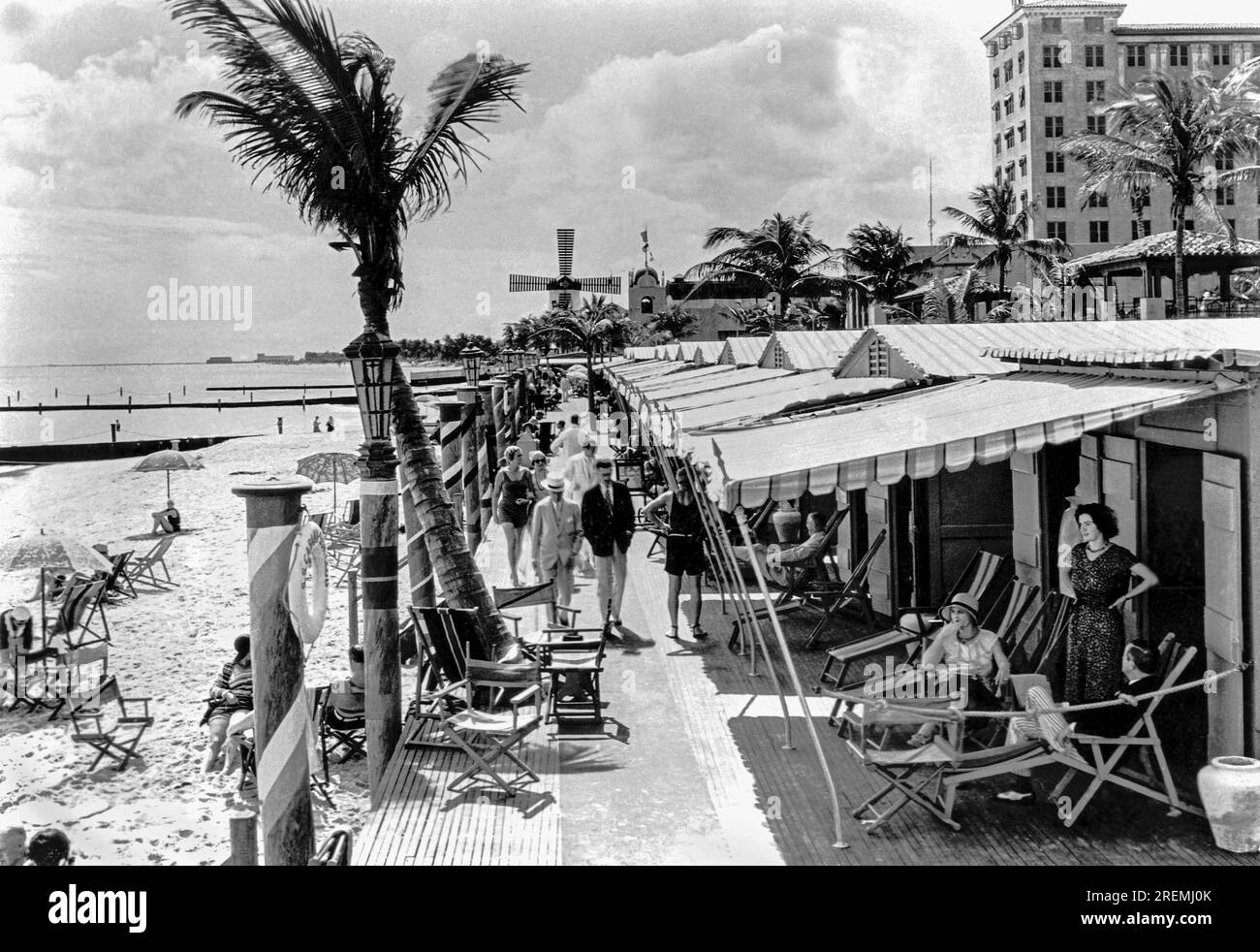 Miami Beach, Florida:  c. 1925 Cabana Row is what they call the boardwalk that runs along the front of the Roney Plaza Cabana Sun Club in Mami Beach, Florida Stock Photo