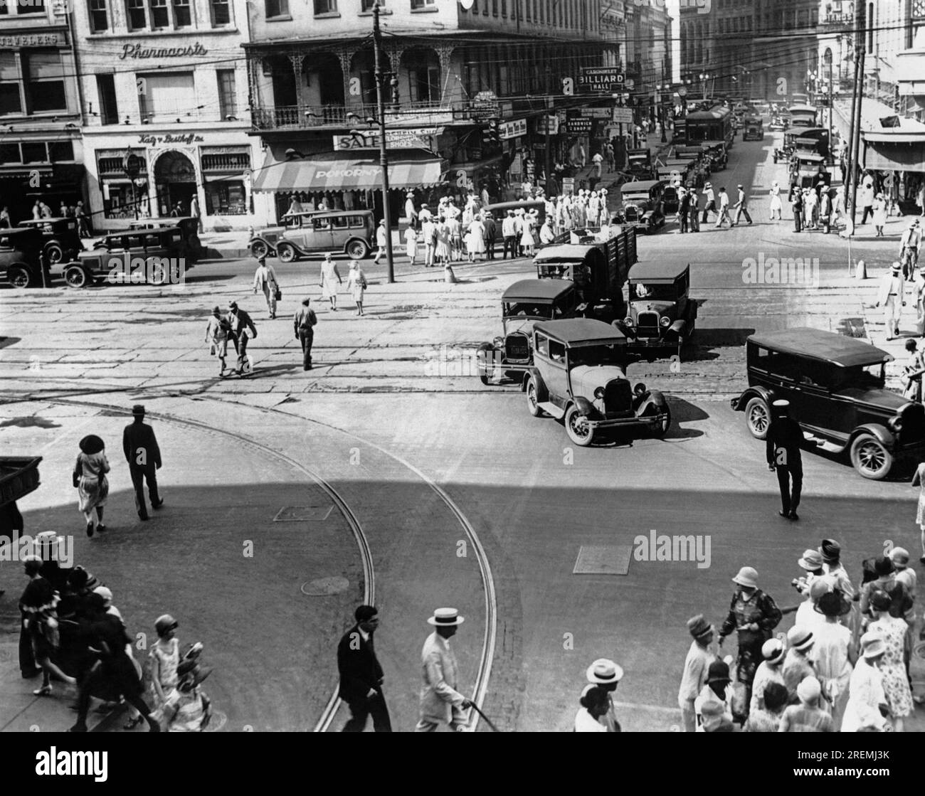 New Orleans, Louisiana:  c. 1927 Traffic at the intersection of Canal and Carondelet Streets in New Orleans. Stock Photo