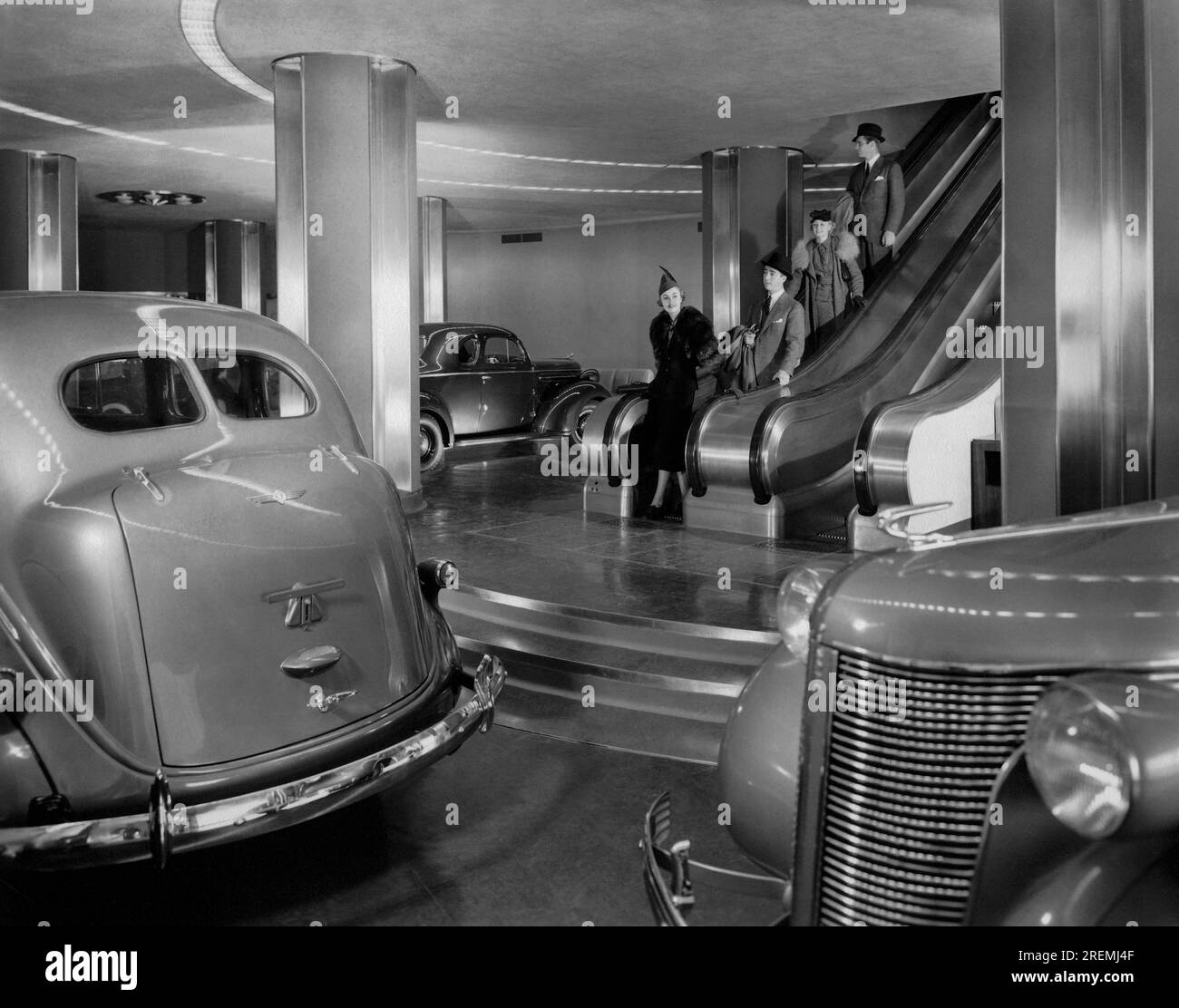New York, New York:  1936 The Chrysler auto display on the ground floor of the Chrysler Building. The elevators led up to the mezzanine level which housed the Walter Chrysler mini museum. Stock Photo
