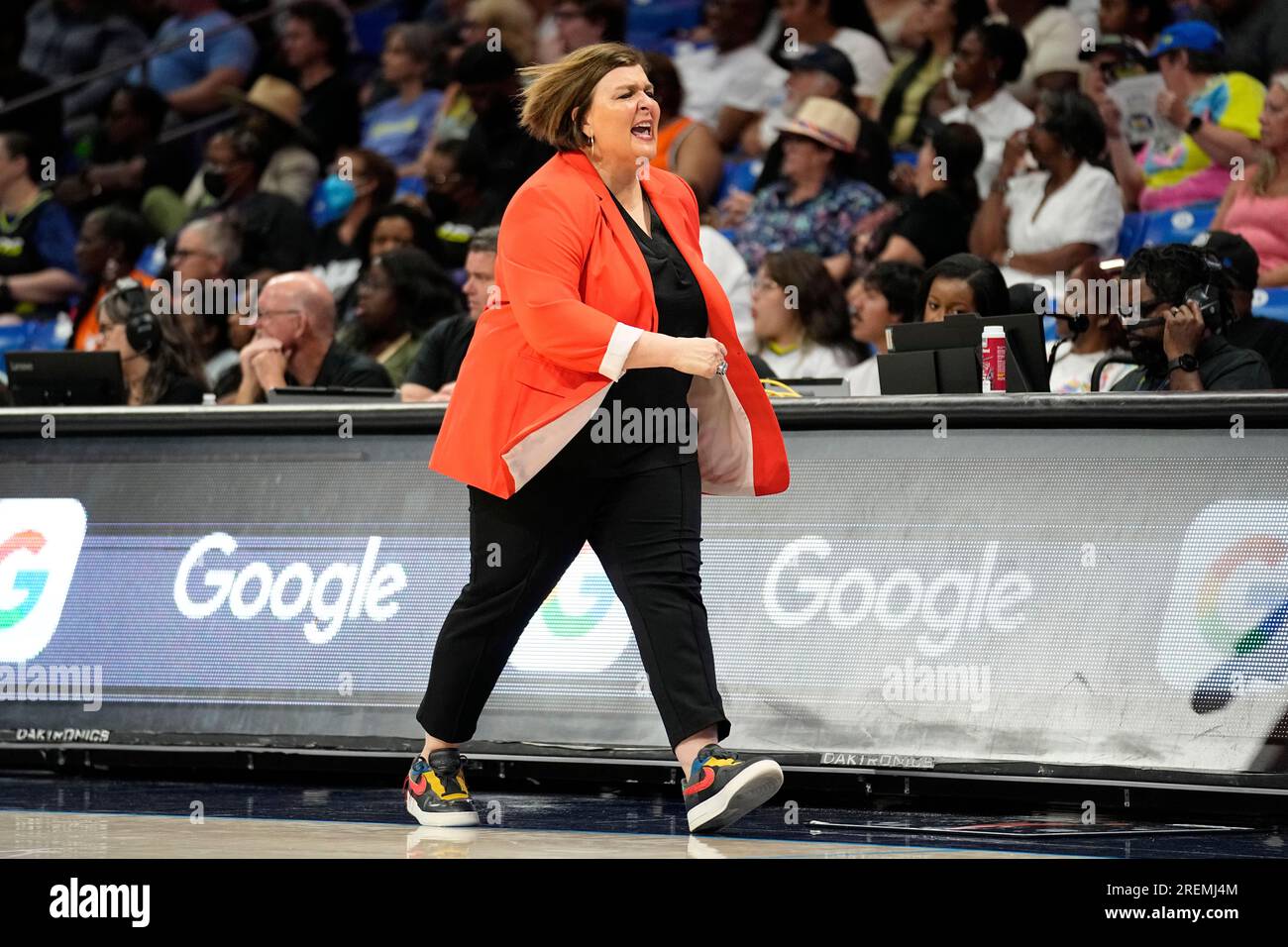 Dallas Wings head coach Latricia Trammell shouts at the bench in the second half of a WNBA