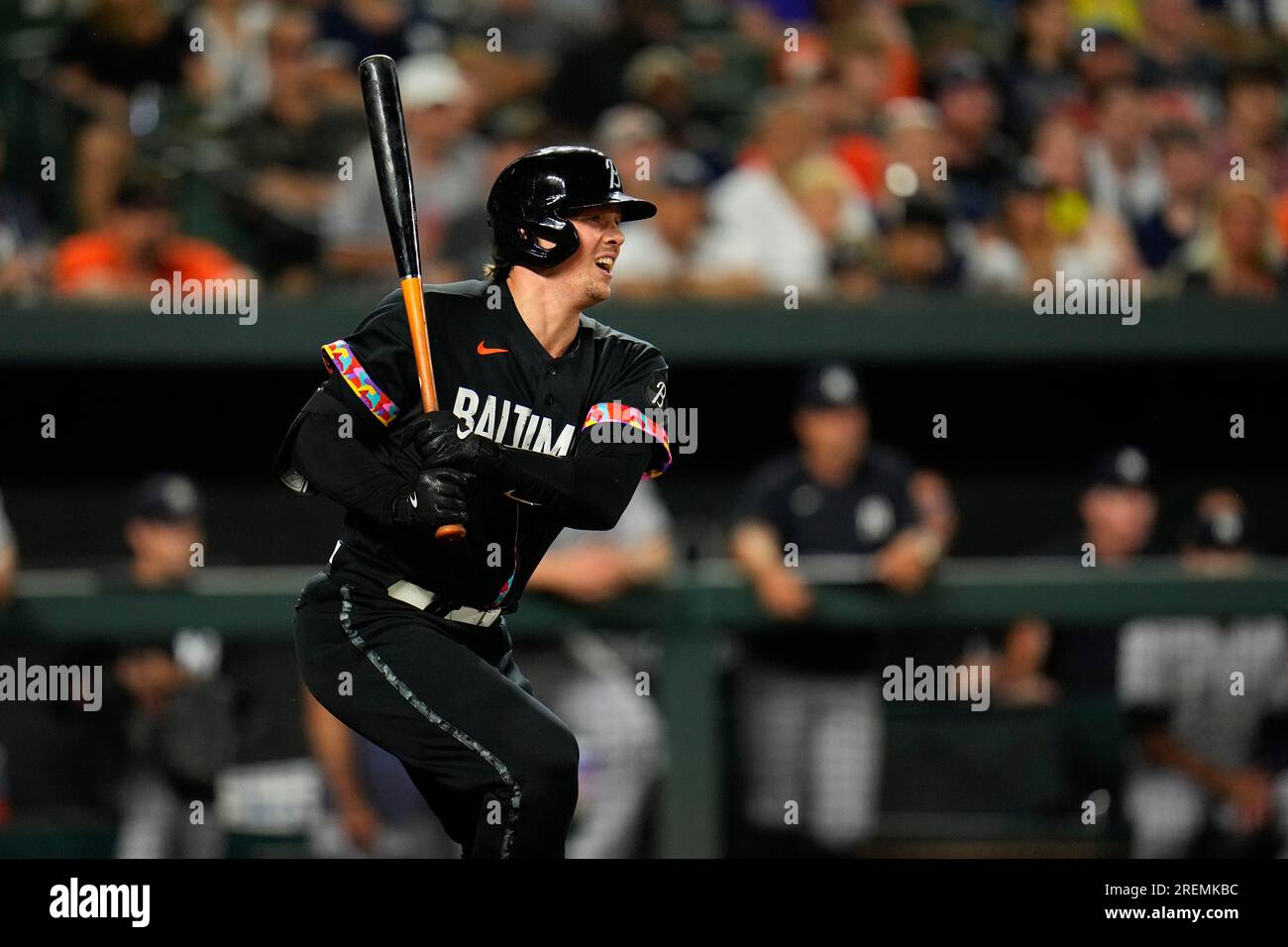 Baltimore Orioles' Adley Rutschman follows through on a swing against the  New York Yankees during the first inning of a baseball game, Friday, July  28, 2023, in Baltimore. (AP Photo/Julio Cortez Stock