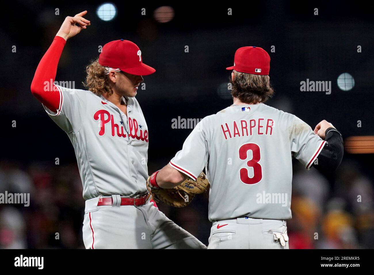 Philadelphia Phillies third baseman Alec Bohm, left, celebrates with first  baseman Bryce Harper after defeating the Pittsburgh Pirates in a baseball  game in Pittsburgh, Friday, July 28, 2023. (AP Photo/Matt Freed Stock