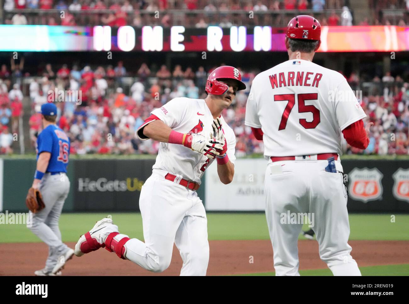 St. Louis, United States. 28th July, 2023. St. Louis Cardinals Lars Nootbaar is congratulated by third base coach Ron Warner after hitting his second solo home run of the game in the third inning against the Chicago Cubs at Busch Stadium in St. Louis on Friday, July 28, 2023. Photo by Bill Greenblatt/UPI Credit: UPI/Alamy Live News Stock Photo